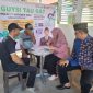 Pedagang Pasar Pagatan Kecamatan Kusan Hilir Kabupaten Tanah Bumbu Mendapatkan Sosialisasi Sertifikat Halal dan Diajari Tata Cara Pendaftaran Produk Agar Dapat Sertifikat Halal