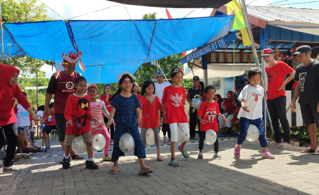 Warga Komplek Berkat Mandiri Kelurahan Gunung Tinggi Kecamatan Batulicin Kabupaten Tanah Bumbu, Saat Gelar Berbagai Perlombaan Bagi Anak-anak dan Dewasa