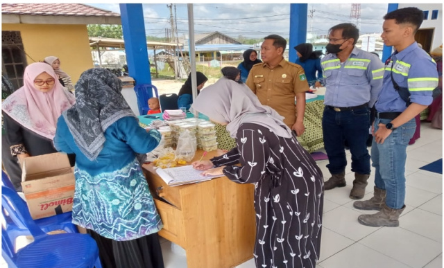 Penyaluran Bantuan PMT ke Posyandu Binaan PT BUMA Jobsite Geo-Aje di wilayah Kecamatan Angsana Kabupaten Tanah Bumbu
