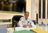 Man Hidayat / Kepala Badan Pengelolaan Keuangan dan Aset Daerah (BPKAD) Tanah Bumbu, Hendra Wardani