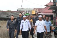 Serdik Sespimmen Polri Dikreg ke 64 Saat Tinjau Lolasi Kebakaran di Gang Mawar Kelurahan Tungkaran Pangeran Kecamatan Simpang Empat Tanah Bumbu, Kalimantan Selatan, Rabu (10/7/2024).