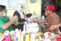 Pengobatan Gratis di Desa Sebelimbigan Kotabaru Bersama PT Wats