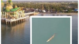 (Tangkapan Layar)- Kemunculan Buaya di Sekitar Masjid Apung Siring Pagatan Yang Tertangkap Kamera Drone