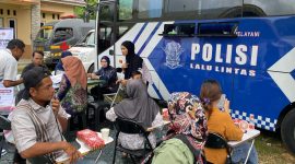 Antusias Warga Lakukan Perpanjangan SIM di Program Kopi Manis Polres Tanah Bumbu di Desa Batu Meranti Kecamatan Sungai Loban