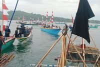Festival Budaya Sarang Tiung 2025 yang berlangsung meriah di kawasan wisata Kampung Nelayan, Minggu (21/12/2025).