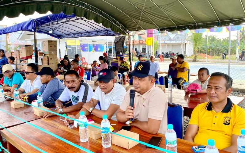 Anggota DPRD Tanah Bumbu, Makhruri Saat Berikan Sambutan di HUT ke 43 Desa Giri Mulya Kecamatan Kuranji, Saat Jalan Sehat digelar pada Minggu (25/1/26).