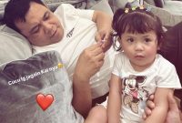 H Isam bersama cucunya